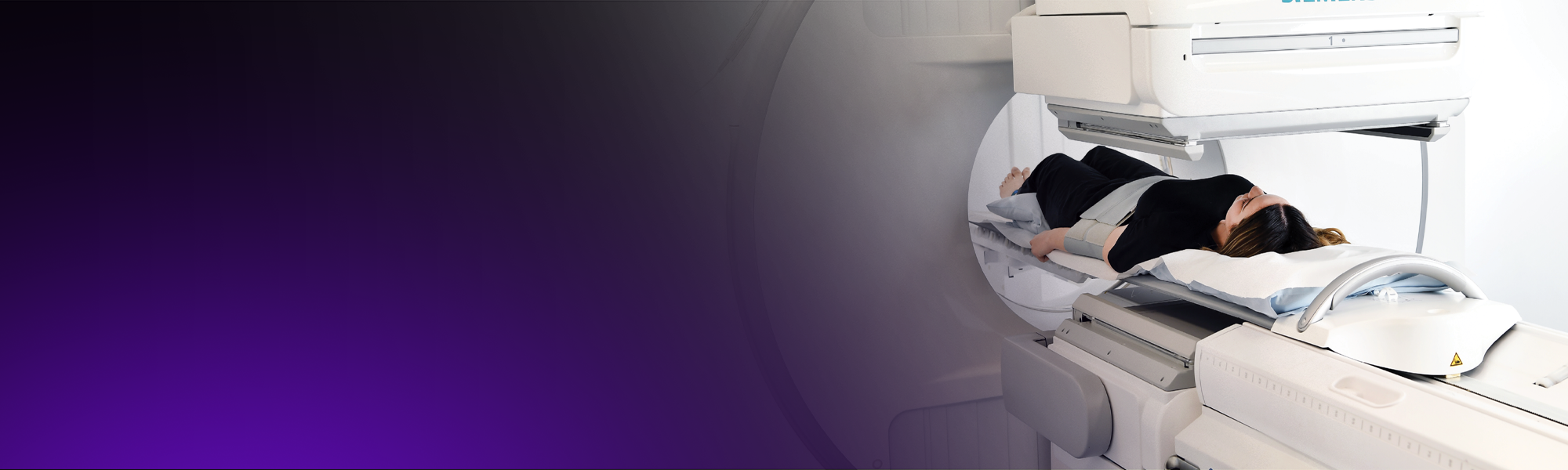 A female patient has a nuclear medicine scan.