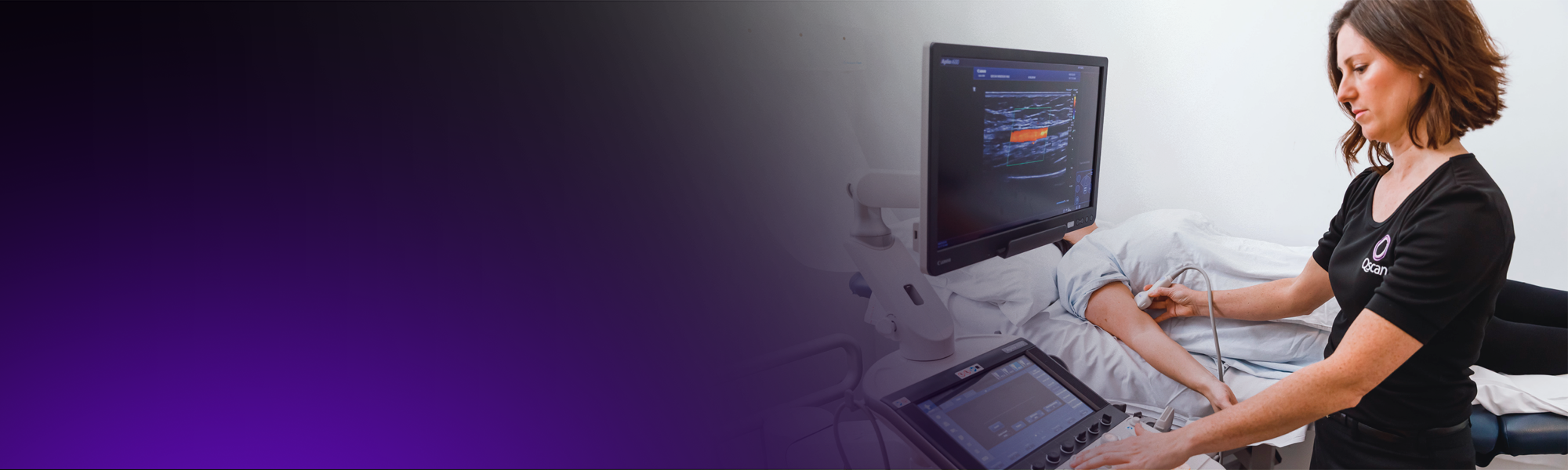 A female sonographer performs an ultrasound