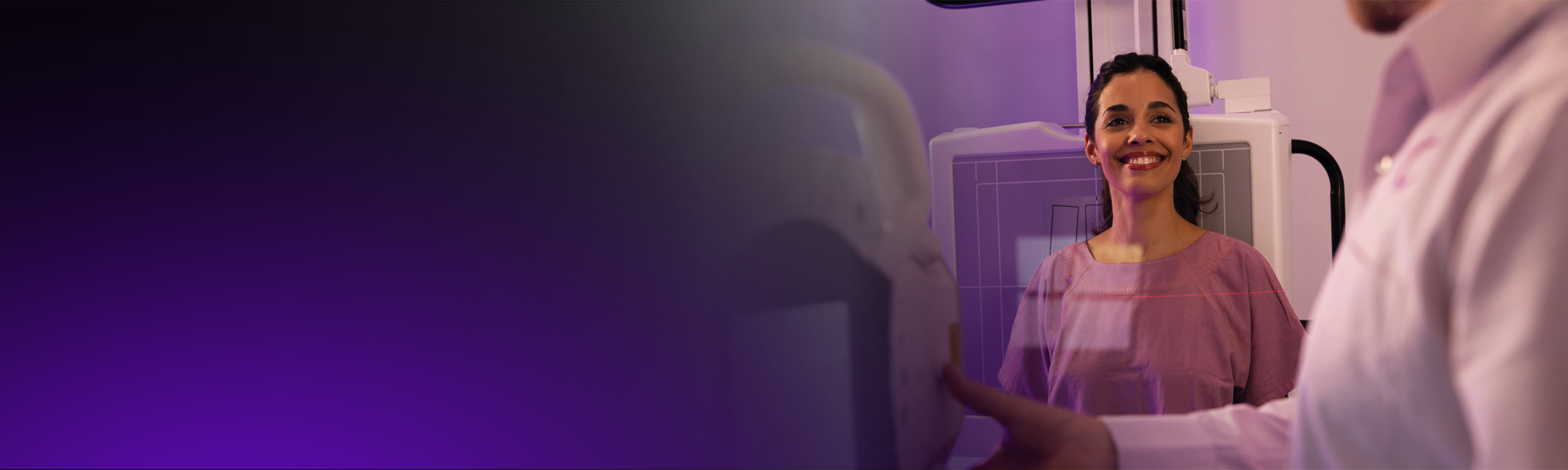 A female patient is positioned for an x-ray